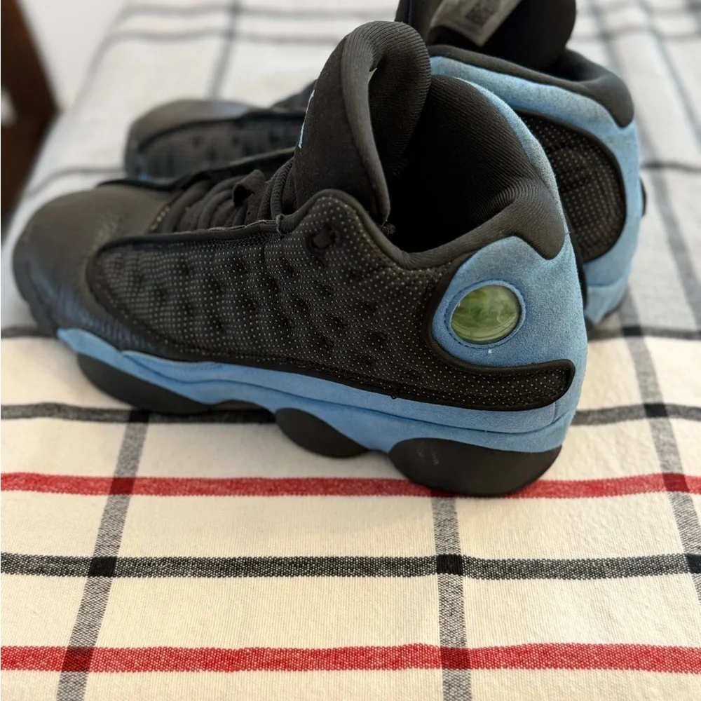 Jordan 13s in Black and Light Blue‎